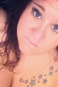 heavy bodacious nymph performing slow sensuous striptease