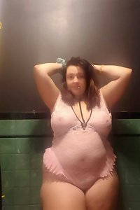 bootylicious bbw taking selfies while undressing temptingly